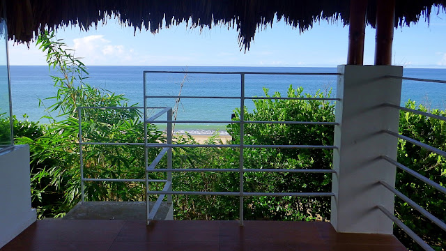 view of the beach, the blue sea and sky from the balcony of Villa #1 in Mikomiko Resort in Mondragon Northern Samar