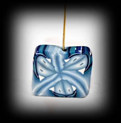 https://bluemorningexpressions.myshopify.com/collections/focal-beads/products/blue-white-focal-handmade-polymer-clay-beads