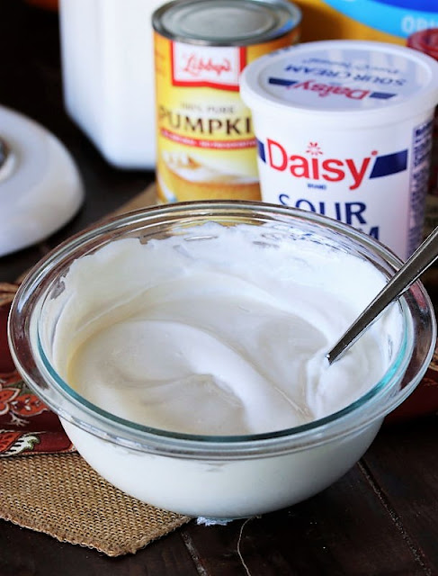 Mixing Pumpkin Cheesecake Sour Cream Topping Image