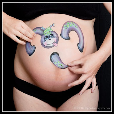 Funny Theme For Pregnant Woman In Body Art Painting