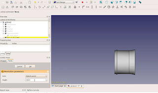 In the revolution dialog select Axis: Sketch axis 0 .