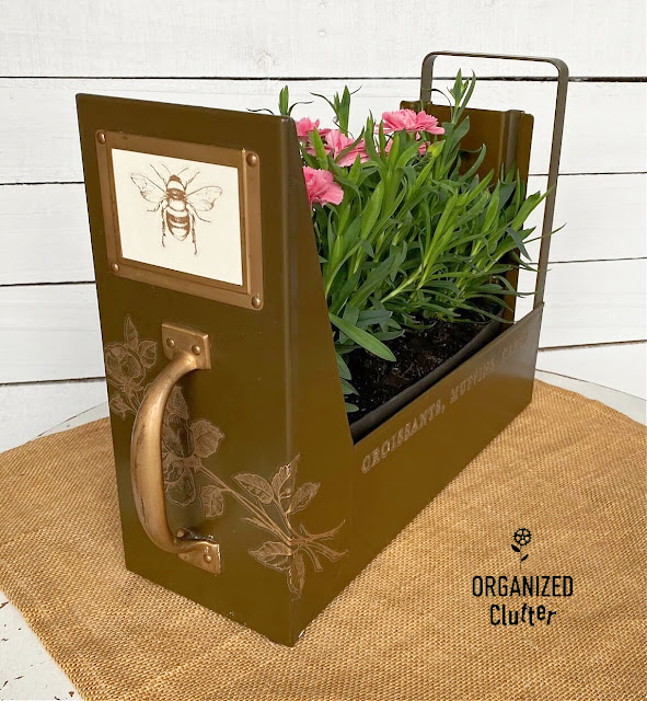 Photo of a vintage metal file drawer upcycled and repurposed as a fun planter box.