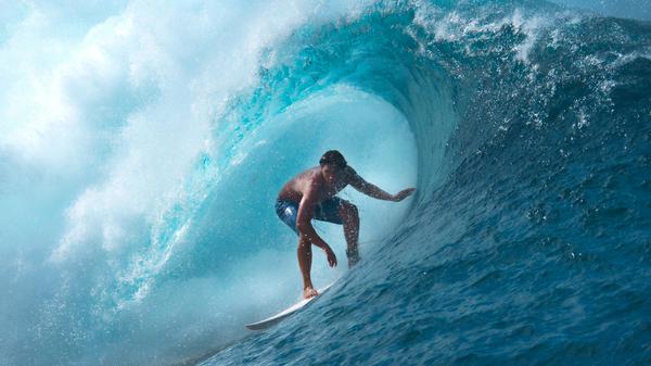 Surfer by Riding the Waves of the Material Ocean