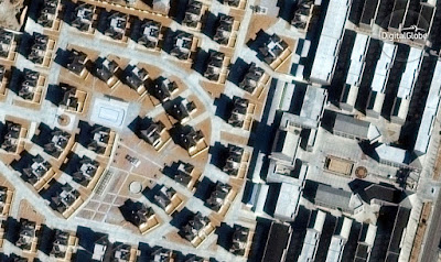 http://www.businessinsider.com/china-ghost-cities-satellite-images-2017-3/#chenggong-has-several-big-new-university-campuses-this-has-sat-mostly-empty-and-unfinished-for-a-while-according-to-digitalglobe-5