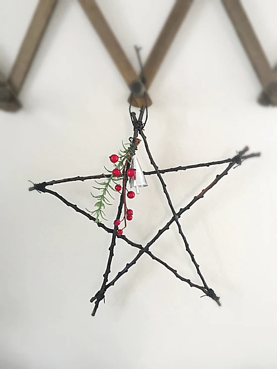 stick star hanging on pegs