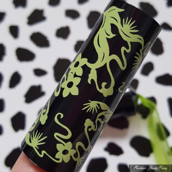 close up of black lipstick case in limited edition green floral print