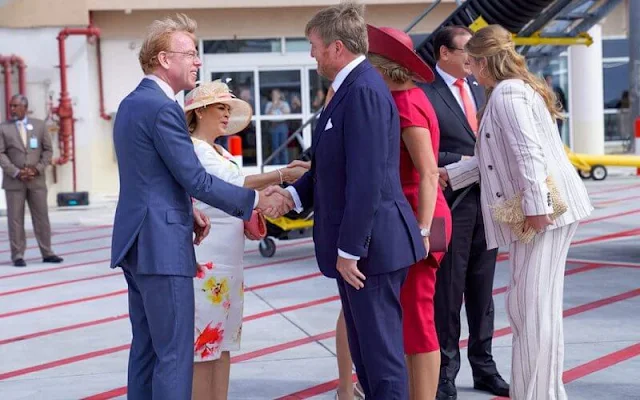 Queen Maxima in Natan Jenny silk crepe dress. Princess Amalia wore a pinstriped cotton and linen blazer suit by Max Mara