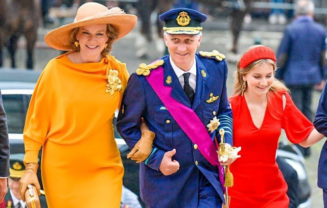 Princess Elisabeth wore a red midi dress by Victoria Beckham. Queen Mathilde, Princess Claire, Princess Delphine