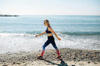 Lady walking on the beach