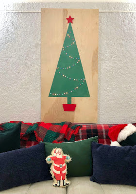 https://www.craftylumberjacks.com/blog/2018/11/23/large-flat-flocked-christmas-tree-for-small-spaces