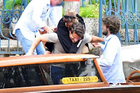 Emma Watson enjoys piggyback ride on Ryan Kohn while out in Venice Lido,  Italy
