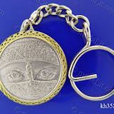 Woman's Eyes With A Niqab. Traditional Arabic impressions. Silver plated minted brass medal 35 mm in diameter.