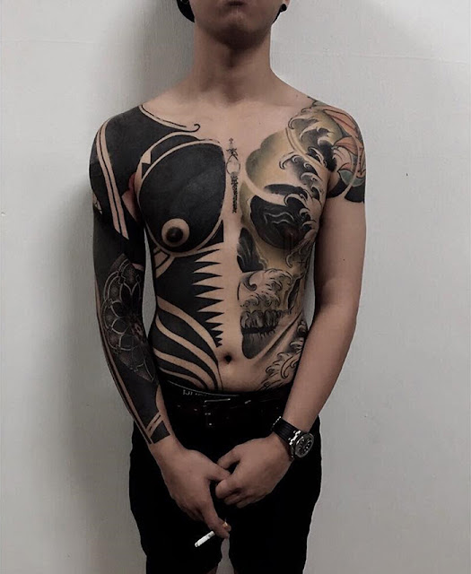 Blackout body tattoos