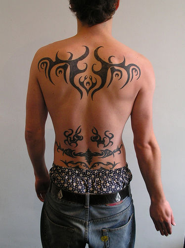 Back tribal tattoos for men can be one of the sexiest tattoo man can get
