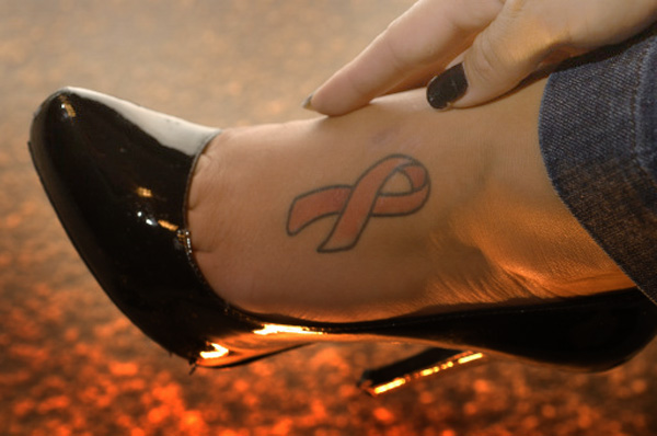 symbol pink ribbon tattoo designs foot. It seems logical that someone who