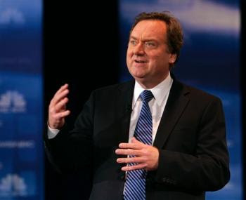 Tim Russert speaks to the crowd during the Democratic presidential debate between Senator Clinton and Senator Obama in Cleveland on February 26, 2008. photo Mark Duncan/AP.