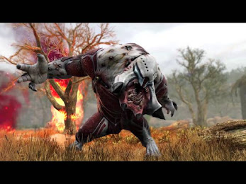 An image of the alien Berserker "Berserking" with its arms outstretched and roaring with a jaw that seems to detach. It is in a lightly wooded plain with the tree behind the berserker being on fire