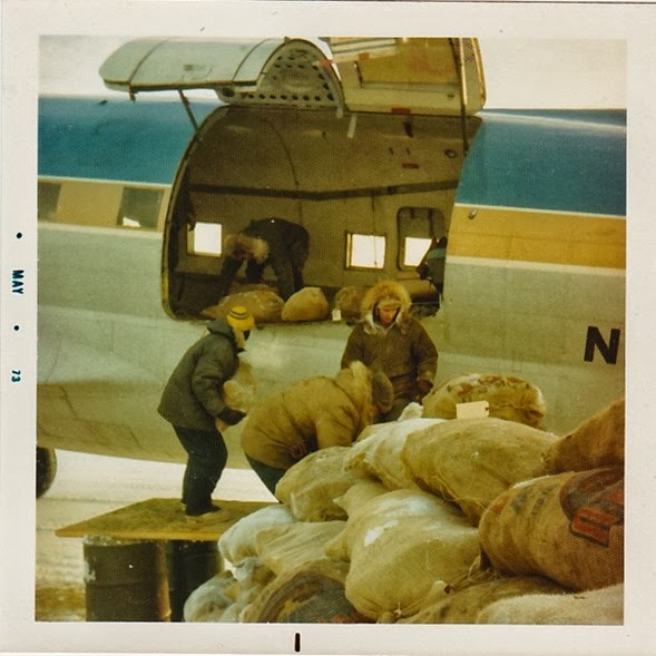 Loading C-46 w-fish bags_1973