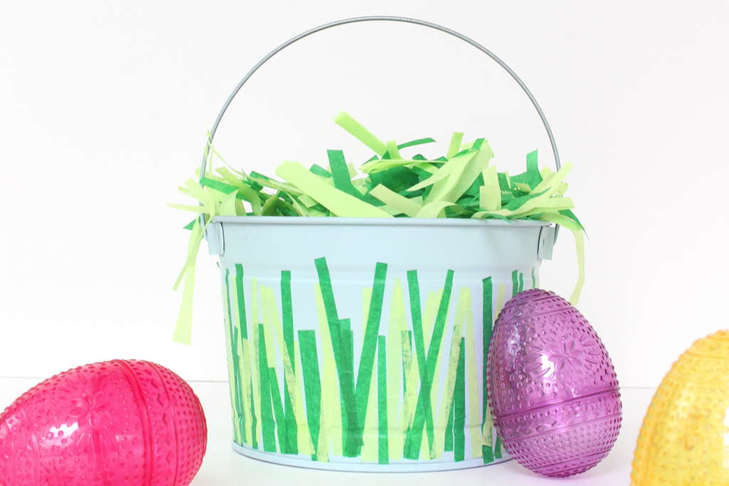 Take a cheap bucket, spray paint it, and add tissue paper - yes please! 