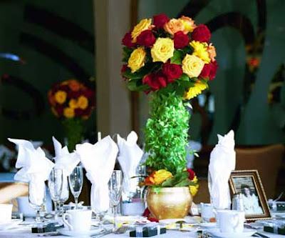 Tall Rose Centerpiece with Orange Red and Yellow Roses from Flowers by Erin