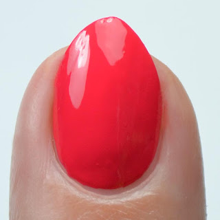 bright red nail polish swatch