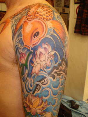  the preferred places for female wearers of the Japanese Koi fish tattoo