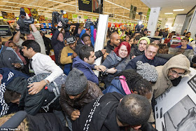 http://www.dailymail.co.uk/news/article-2852585/Mayhem-Black-Friday-begins-Shoppers-clash-supermarkets-trying-grab-bargains-Boots-Game-Curry-s-PC-world-websites-crash-thousands-start-hunt-Christmas-deals.html