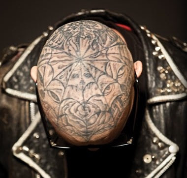 Tim Armstrong is the lead singer of the punk band Rancid, and the tattoo on 