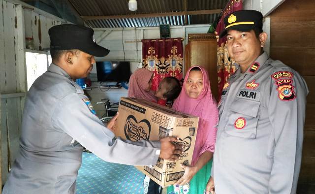 Jalinan Kasih Mutiara Hati Kapolsek Serbajadi Polres Aceh Timur Kepada Bocah Penderita Hidrosefalus