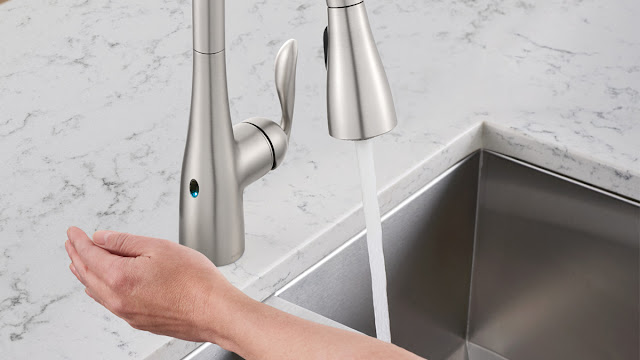 Motion sensor kitchen faucet saves gallons of water.