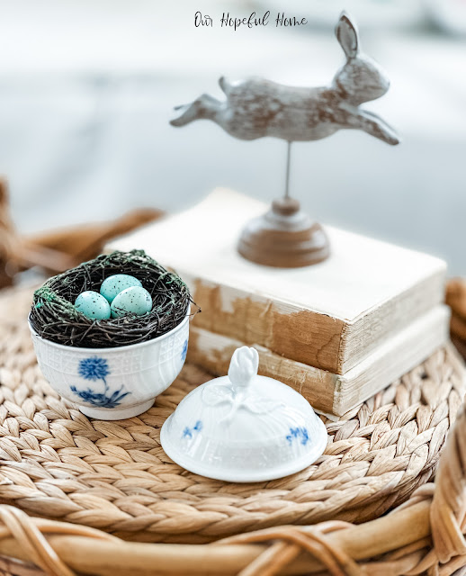 faux bird's nest blue eggs bunny statue