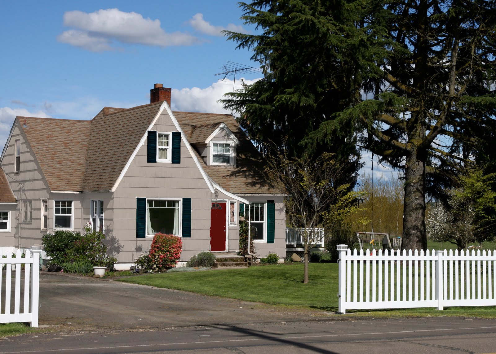 front door trim pictures Tan House with Black Shutters | 1600 x 1143