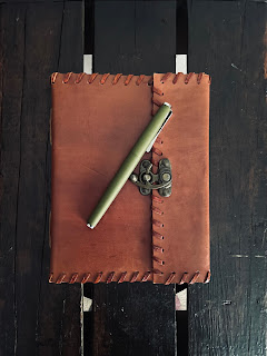 A journal with a pen