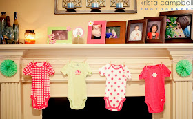 onesies hanging, pink onesies, nany shower, lil ladybug, pink & green