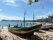 But right now, the beach at Unawatuna, other than being wet, . (beach)