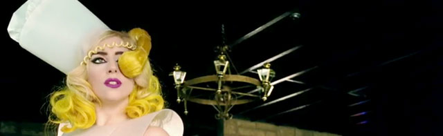 Gaga's head is the telephone.