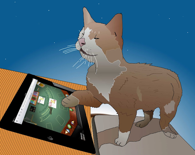 cat playing ipad blackjack