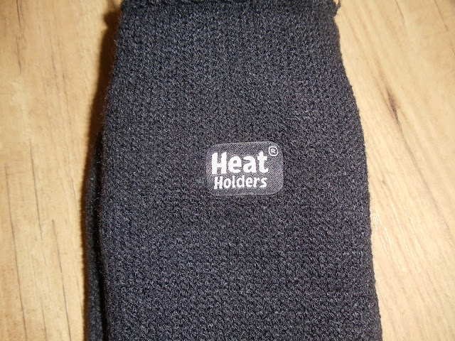 The heat holder logo on a pair of socks