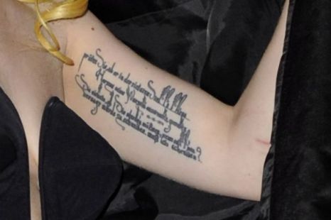 Does anyone know the font or a font that is similar to Gaga's tattoo on her