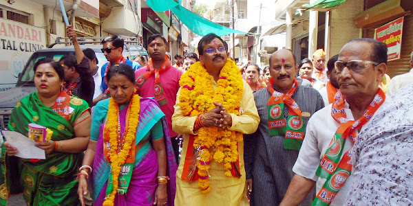भाजपा प्रत्याशी गुमानसिंह डामोर ने नगर में किया जनसंपर्क