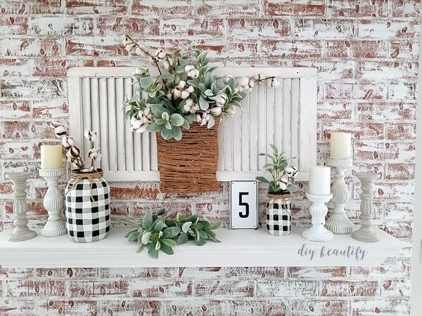 white painted brick fireplace and mantel