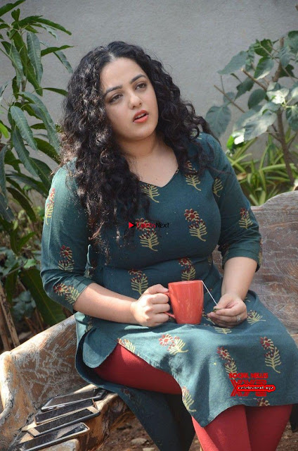 Nithya Menon promotes her latest movie in Green Tight Dress ~  Exclusive Galleries 002.jpg