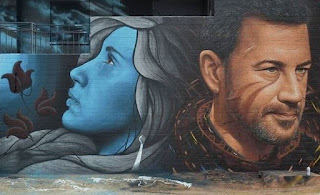 Graffiti on canvas by Jorit Agoch & Mandragora Leticia