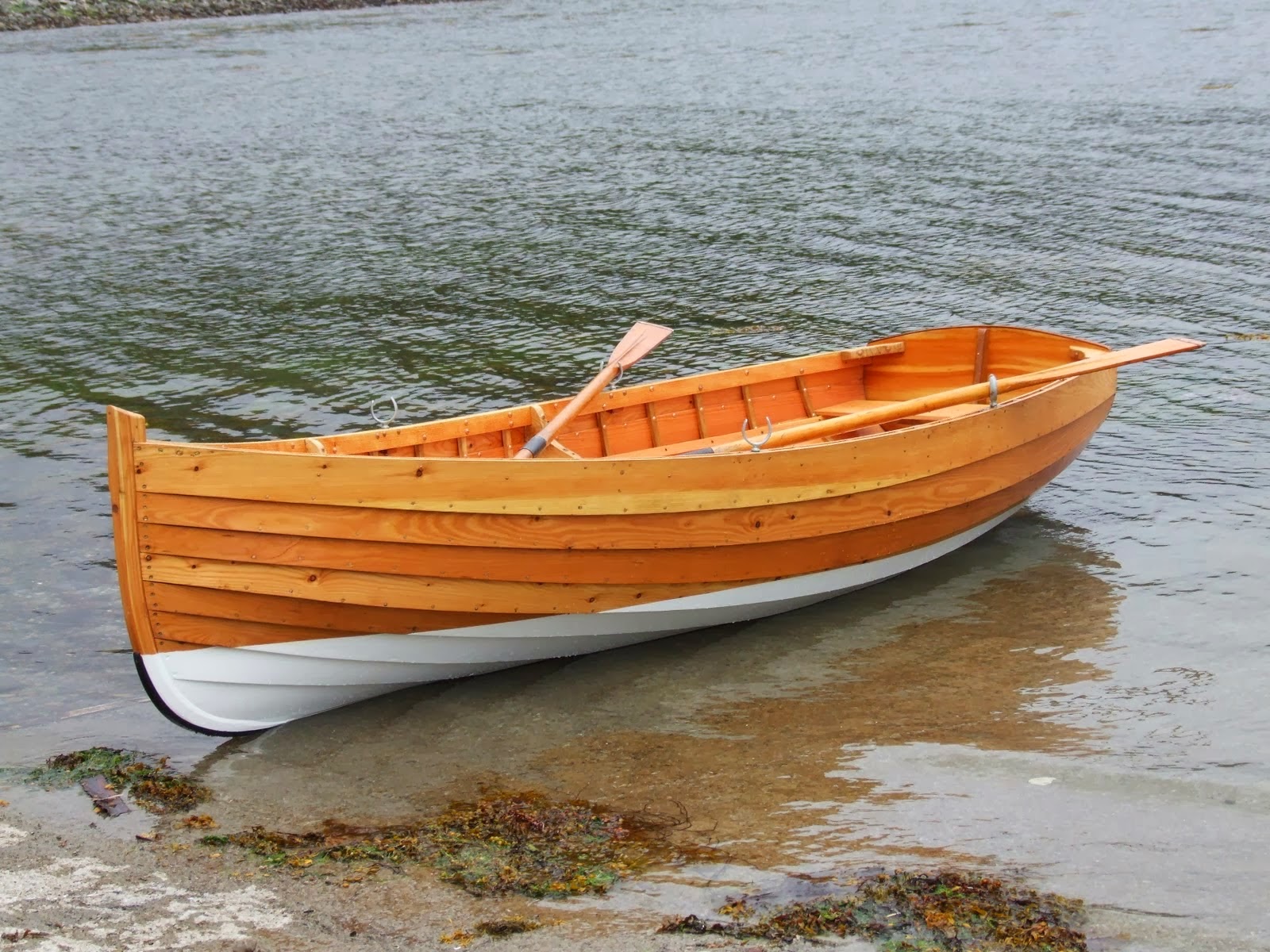 Small wooden boat designs