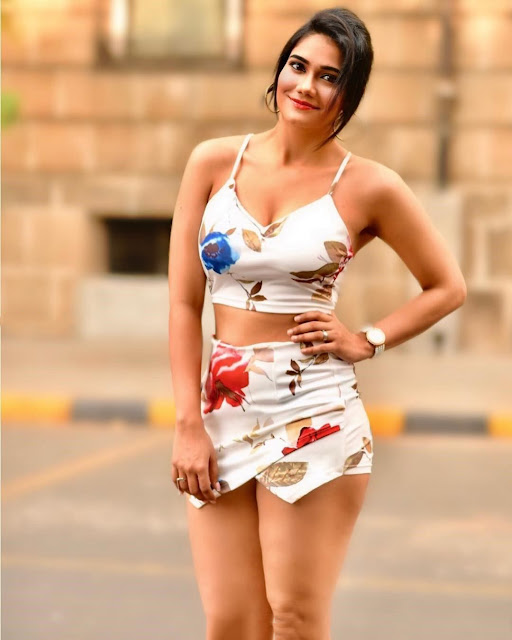Ruchi Shah radiates confidence in a chic short dress, showcasing her bold style.