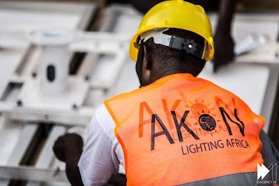 men at work on Akon Lighting Africa