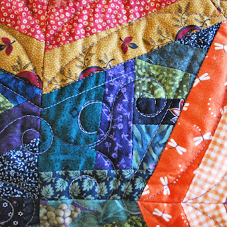 Pumpkin Patch at Midnight spiderweb quilt: QuiltBee