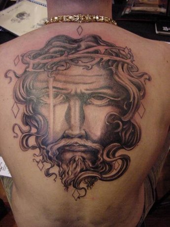 A very cool Jesus tattoo design on the back so realistic