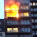 Fire takes over12-story apartment block in Manchester