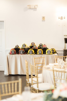 firefighters helmets at wedding reception